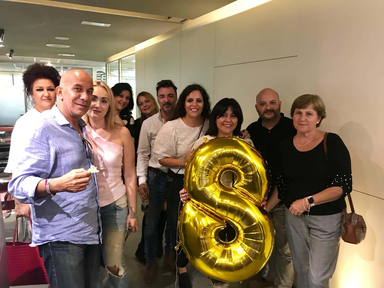 Clientes de Negocia celebrando el 8º aniversario